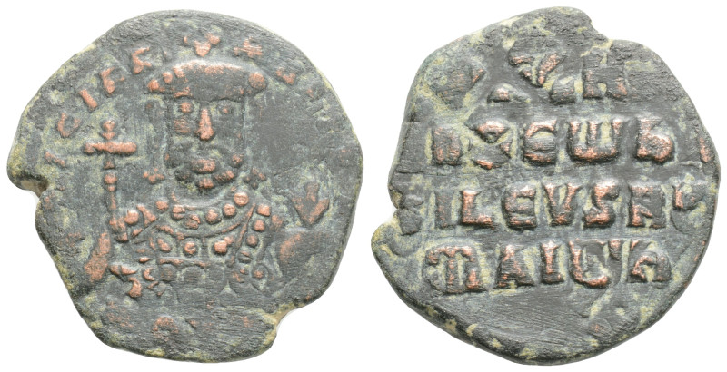 Romanus I Æ Nummus. AD 920-944. +RѠmAn' bASILЄVS RѠm', facing bust of Romanus I,...