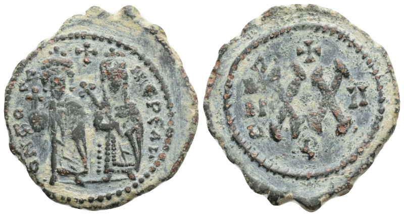 BYZANTINE EMPIRE. Phocas, with Leontia. 602-610. Æ half follis. Thessalonica min...