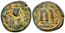 Arab-Byzantine, AE Fals, Emesa 

 Arab-Byzantine . Umayyad Caliphate. AE Fals (19-21 mm, 3.37 g), Emesa (Homs).
Album 3524; SICA 543-547.

Nice&n...