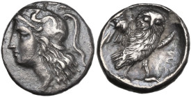 Greek Italy. Southern Apulia, Tarentum. AR Drachm, 280-272 BC. Obv. Head of Athena left, wearing helmet decorated with Scylla. Rev. Owl standing on th...