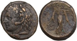 Sicily. Syracuse. Pyrrhos (278-276 BC). AE 24 mm. c. 278-276 BC. Obv. ΣΥΡΑΚΟΣΙΩΝ. Head of young Herakles in lion skin headdress left; behind, cornucop...