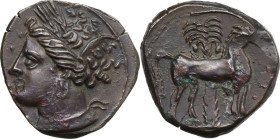 Punic Sardinia. AE 16 mm. Circa 360-330 BC. Uncertain mint. Obv. Wreathed head of Kore left, wearing triple-pendant earring. Rev. Horse standing right...