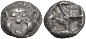 Greek Asia. Mysia, Parion. AR Drachm, c. 550-520 BC. Obv. Gorgoneion facing, with open mouth and protruding tongue. Rev. Incuse square with irregular ...
