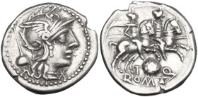 T. Quinctius Flamininus . AR Denarius, 126 BC. Obv. Helmeted head of Roma right; below chin, barred X; behind, flamen's cap. Rev. The Dioscuri gallopi...