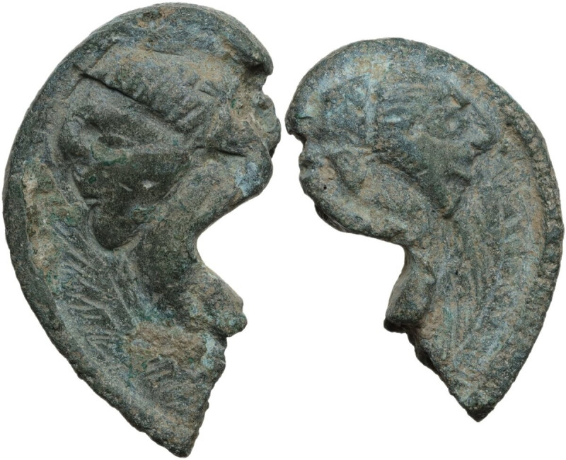 Bronze fragment (handle?) with female and male profile. Late roman. 36 x 22 mm. ...