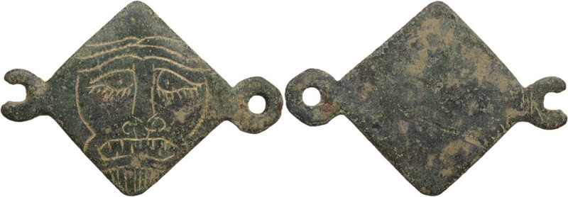 Bronze decorative element with engraving of a bearded face. Balkanic. 53x37 mm.