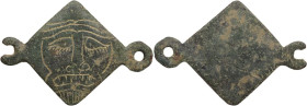 Bronze decorative element with engraving of a bearded face. Balkanic. 53x37 mm.