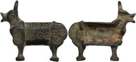 Bronze decorative element in the shape of a donkey, with engraving pattern of circles. Balkanic. 37x32 mm.
