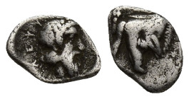 Caria. Euromos circa 400 BC. Hemiobol AR (10mm, 0.4 g). ΛΕΧΨ. Laureate, bearded head right. / Forepart of boar right.