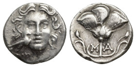 CARIA. Mylasa. Circa 170-130 BC. Drachm (14mm, 2.1 g). Head of Helios facing; before, to left, eagle with folded wings standing right. Rev. M-A Rose w...