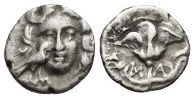 CARIA. Mylasa. Circa 170-130 BC. Drachm (14mm, 2 g). Head of Helios facing; before, to left, eagle with folded wings standing right. Rev. M-A Rose wit...
