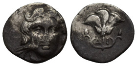 CARIA. Mylasa. Ca. 175-130 BC. AR drachm (15mm, 1.8 g). Ca. 175-150 BC. Head of Helios facing; eagle standing right at cheek to left / Δ-I.