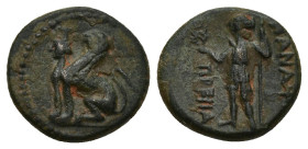 Pamphylia, Perge Æ (13mm, 2.1 g) Circa 222-189 BC. Sphinx with curved wings seated to left, wearing kalathos / Artemis standing facing, head to left, ...