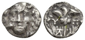 CARIA, Mylasa. Circa 170-130 BC. AR Drachm (13mm, 1.9 g). Rhodian standard. Facing head of Helios; to lower left, eagle standing right / Rose with bud...