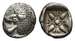 Miletos, Ionia. AR Obol (8mm, 1 g), c. 525-475 BC. Obv. Forepart of lion left. Rev. Stellate pattern in incuse square.