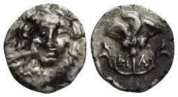 CARIA. Mylasa. Circa 170-130 BC. Drachm (14mm, 2 g). Head of Helios facing; before, to left, eagle with folded wings standing right. Rev. M-A Rose wit...