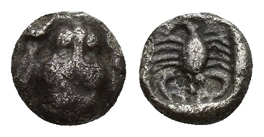 Caria, Mylasa. 450-400 B.C. AR obol (6mm, 0.39 g). Facing forepart of lion / Sco...