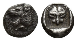 CARIA. Uncertain. Obol (8mm, 0.61 g) (5th century BC). Obv: Forepart of a roaring lion left. Rev: Facing panther’s head within incuse square.