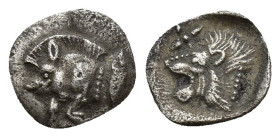 MYSIA, Kyzikos. Circa 450-400 BC. AR obol (8mm, 0.38 g) Forepart of boar left; to right, tunny upward. Rev: Head of roaring lion left; star in upper l...