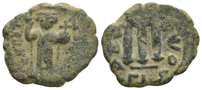 Arab-Byzantine (660-680). Ae. (22mm, 4.7 g) Fals. Obv: Emperor standing facing, ...