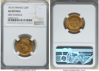 Napoleon gold 20 Francs 1813-A AU Details (Obverse Damage) NGC, Paris mint, KM695.1. Antique golden color with red toning and underlying luster. 

HID...