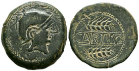 CARMO (Carmona, Sevilla). As. (Ae. 21,09g/33mm). 80 a.C. (FAB-454). Anv: Cabeza masculina con casco a derecha, dentro de corona de laurel. Rev: Dos es...