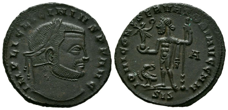 LICINIO I. Follis. (Ae. 4,16g/24mm). 313 d.C. Siscia. (RIC 229a). Anv: Cabeza la...