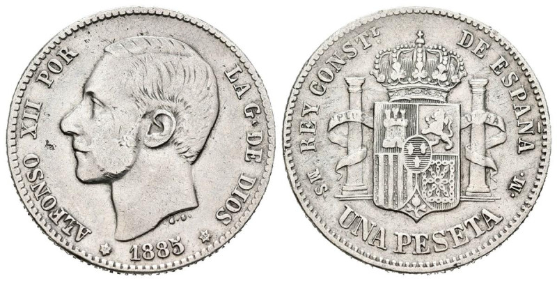 ALFONSO XII. (1874-1885). 1 Peseta (Ar. 4,96g/23mm). 1885 *18-85. Madrid MSM. (C...