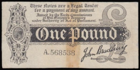 One Pound Bradbury T1 issued 1914 series A.568538, perhaps VF for overall wear but with a central brown stain both sides where once taped together ove...