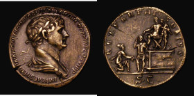 Ae Sestertius. Trajan. C, 116-117 AD. Rev; REX PARTHIS DATVS, Trajan seated left on platform, presenting Parthamaspates to kneeling Parthian; attendan...