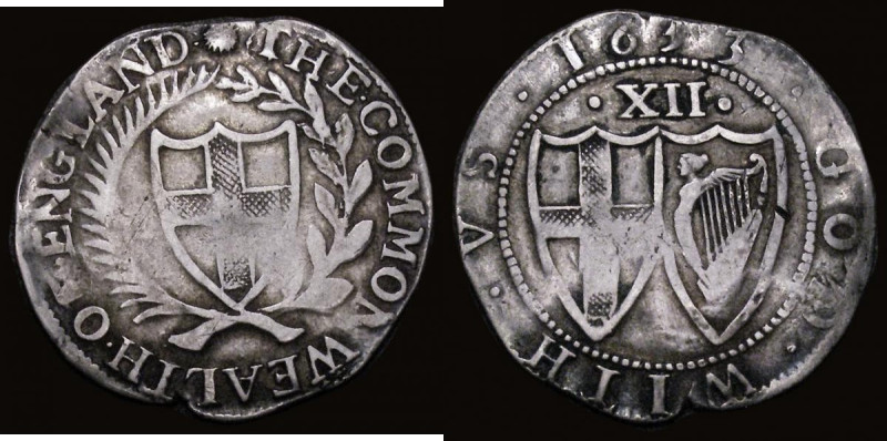 Shilling 1653 Commonwealth T of THE overstruck , possibly over a G as listed by ...