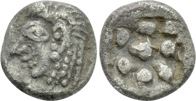 IONIA. Kolophon. 1/24 Stater (Circa 530/25-500 BC).

Obv: Archaic head of Apol...