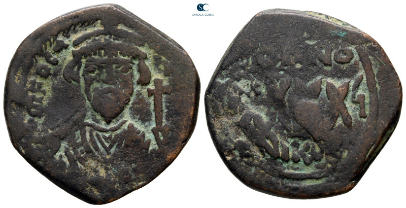 Phocas AD 602-610. Constantinople
Follis Æ

29 mm, 11,71 g



very fine