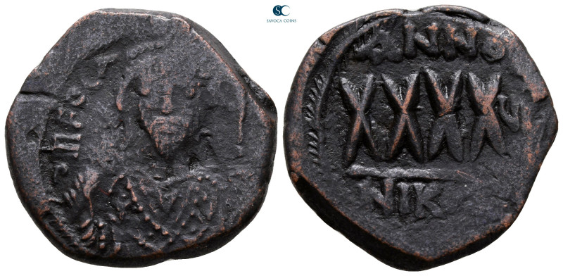 Phocas AD 602-610. Nikomedia
Follis or 40 Nummi Æ

28 mm, 11,44 g



near...