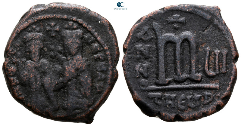 Phocas, with Leontia AD 602-610. Theoupolis (Antioch)
Follis or 40 Nummi Æ

2...