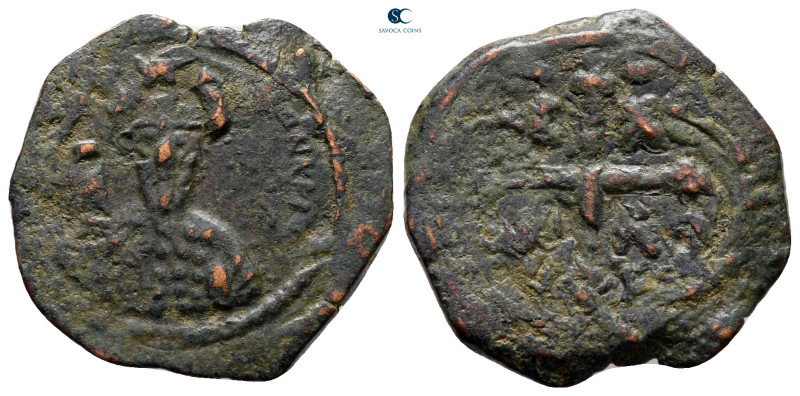 Principality of Antioch. Tancred. As regent AD 1104-1112. 
Follis Æ

22 mm, 3...