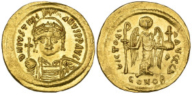 Justinian I (527-565), solidus, Constantinople, 542-565, facing bust holding globus cruciger, rev., angel standing facing holding Christogram-topped s...