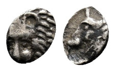 Caria, uncertain mint AR Hemitartemorion. Circa 5th century BC. Head of lion? to left / Forepart of bull to left; within incuse square. Apparently unp...