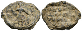 Byzantine lead seal. Domestikos, name illegible, c. IX cent.
Saint (Demetrios?) standing, holding spear, his left hand set on shield resting on groun...