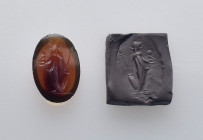 Roman Gemstone with Fortuna holding rudder. 2nd-3rd century AD. Property of a private collector; acquired before 2000s. 0,45g, 17mm