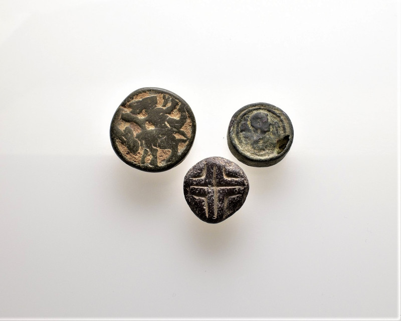 Lot of 3 items. Button (horseman), Button (head of a person), Stamp from black s...