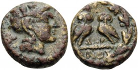 ATTICA. Athens . Circa 322/17-307 BC. (Bronze, 13 mm, 2.01 g, 10 h). Helmeted head of Athena to right. Rev. AΘE Two owls standing facing on thunderbol...