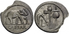 Julius Caesar. Denarius (Silver, 19 mm, 3.32 g, 9 h), mint moving with Caesar, 49-48 BC. CAESAR Elephant trampling serpent to right. Rev. Priestly imp...