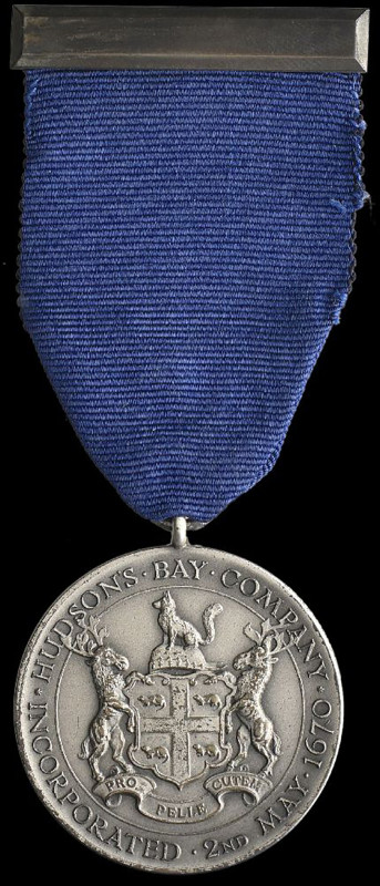 Hudson’s Bay Company Long Service Medal, by John Pinches, with silver top bar, i...