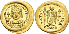 Justinian I, 527-565. Solidus (Gold, 21 mm, 4.49 g, 6 h), Constantinopolis, circa 537-542. D N IVSTINIANVS P P AVG Helmeted, diademed and cuirassed bu...