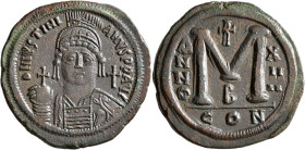 Justinian I, 527-565. Follis (Bronze, 38 mm, 23.42 g, 6 h), Constantinopolis, RY 14 = 540/1. D N IVSTINIANVS P P AVC Helmeted, diademed and cuirassed ...