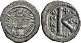 Justinian I, 527-565. Half Follis (Bronze, 30 mm, 11.06 g, 7 h), Nicomedia, RY 15 = 541/2. D N IVSTINIANVS P P AVC Helmeted, diademed and cuirassed bu...