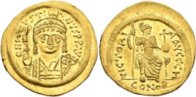 Justin II, 565-578. Solidus (Gold, 21 mm, 4.48 g, 6 h), Constantinopolis, 567-578. D N IVSTINVS P P AVG Helmeted, diademed and cuirassed bust of Justi...