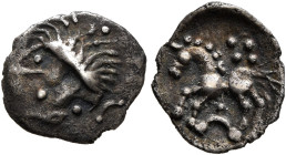 CENTRAL EUROPE. Vindelici. 1st century BC. 1/4 Quinar (Silver, 10 mm, 0.43 g), 'Manching II' type. Celticized male head with spiky hair to left. Rev. ...
