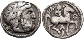 LOWER DANUBE. Uncertain tribe. Circa 3rd century BC. Tetradrachm (Silver, 24 mm, 13.53 g, 12 h), imitating Philip II of Macedon. Laureate head of Zeus...